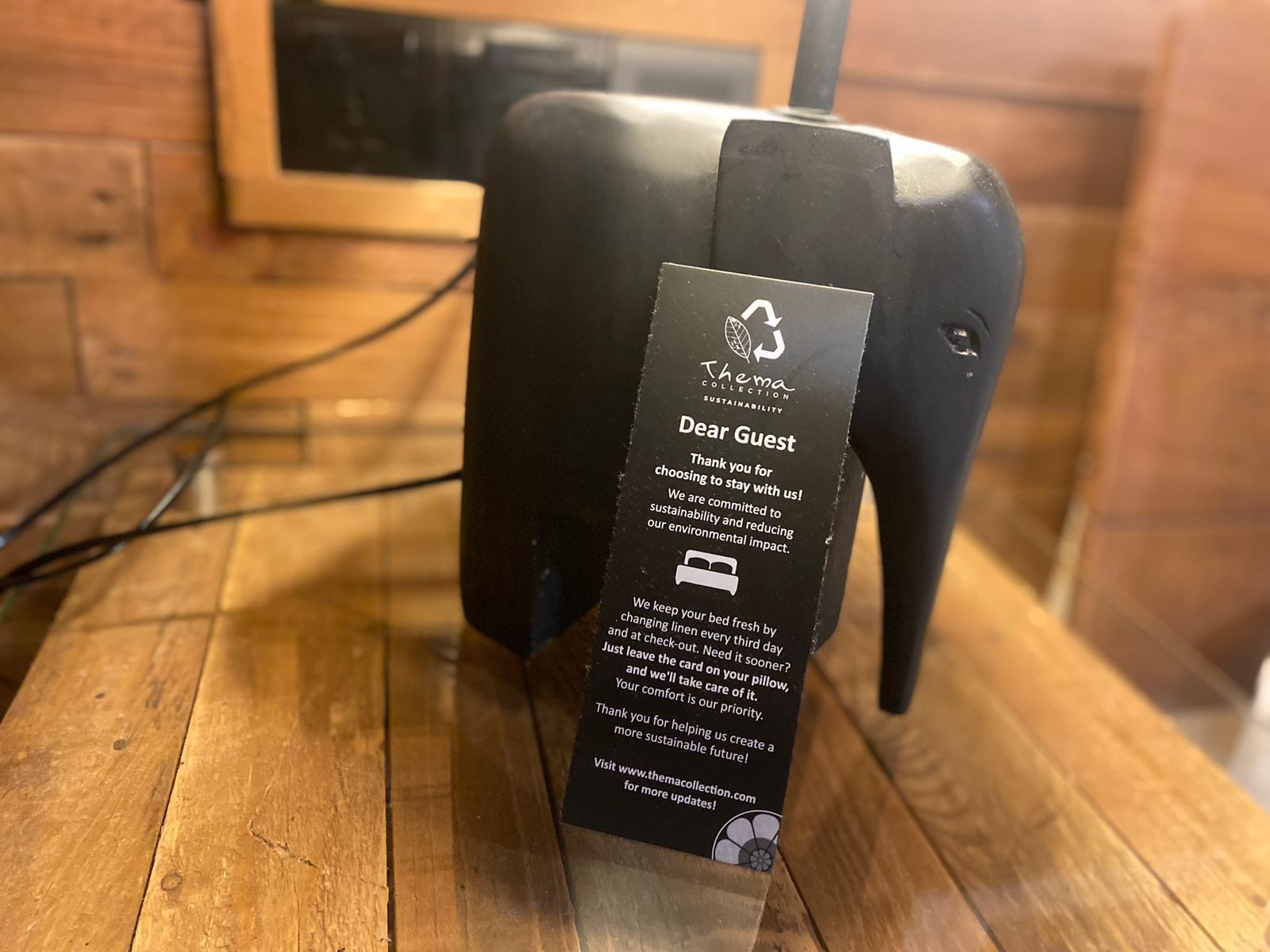 Elephant-shaped display with a sustainability pledge in a Sri Lankan eco resort room