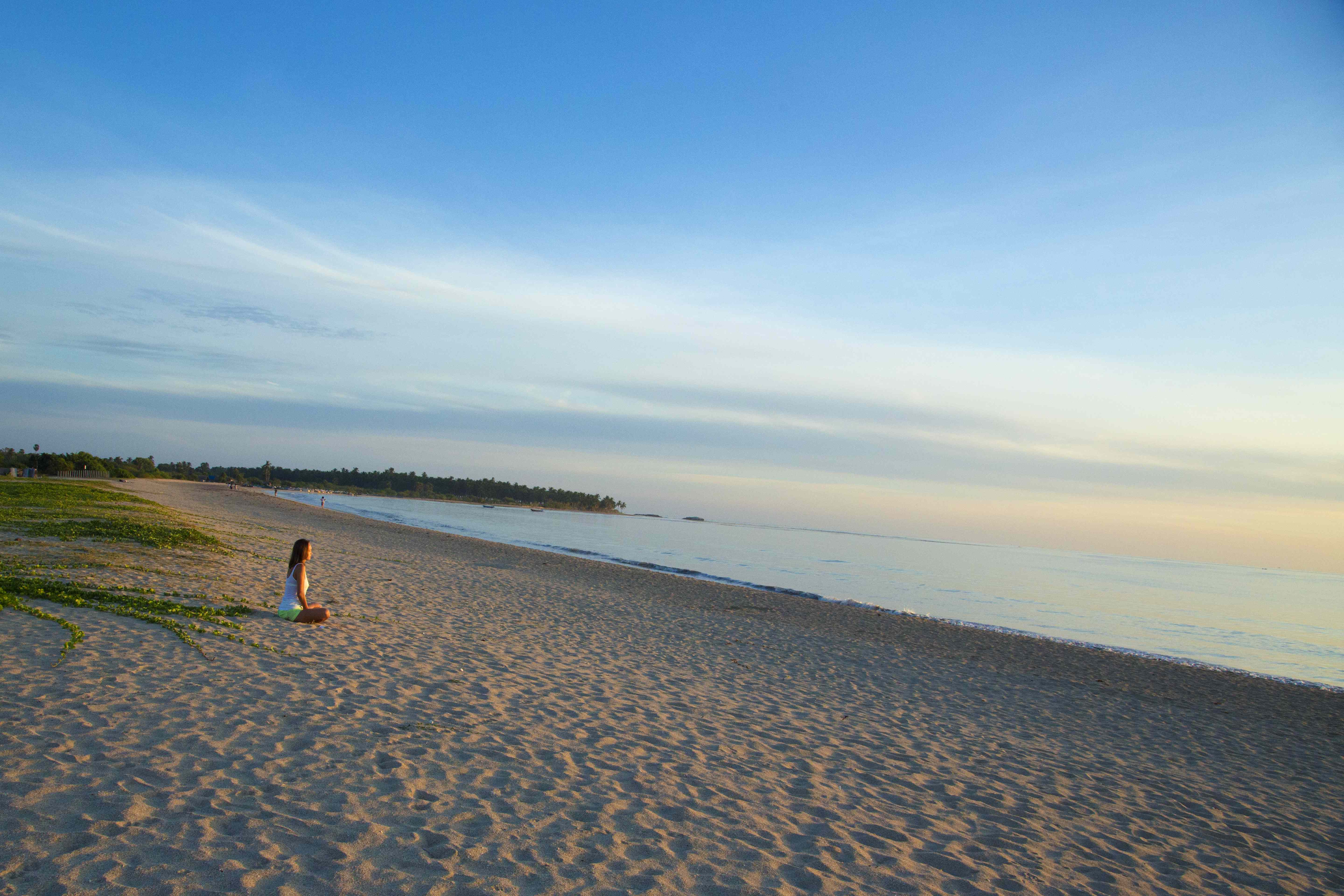 Woman at Pasikuda beach, Batticaloa Sri Lanka.