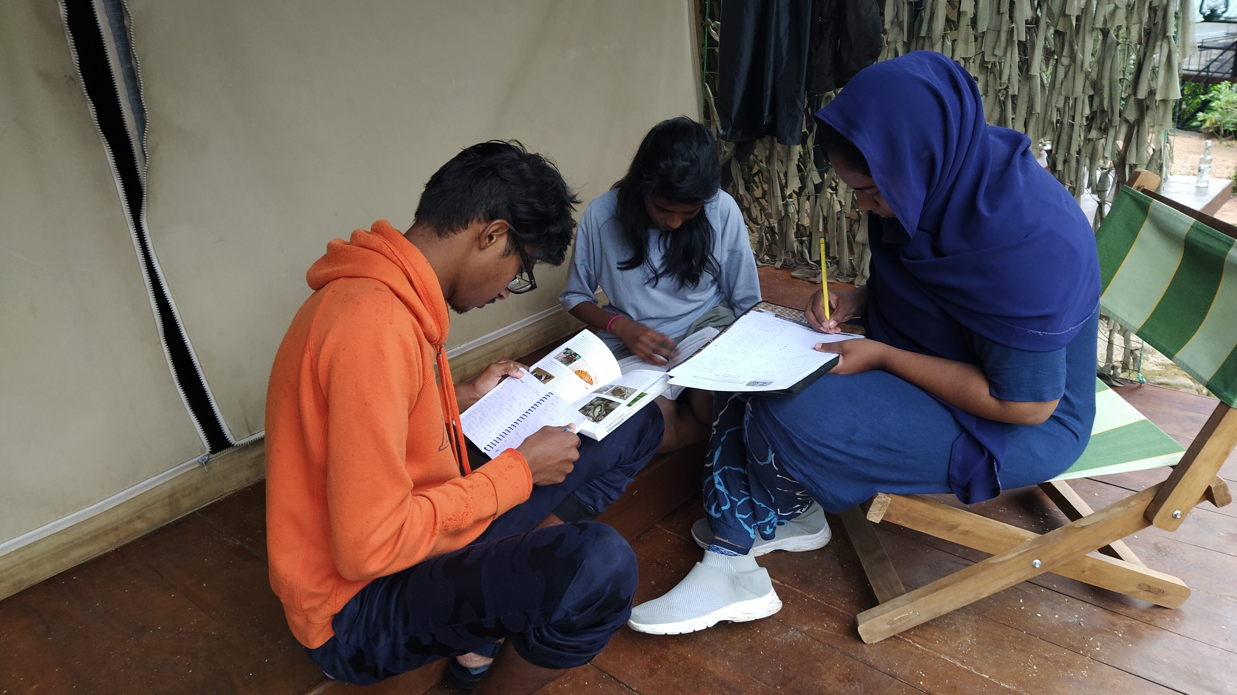 Students engaged in biodiversity study at glamping site – Glamping in Sri Lanka