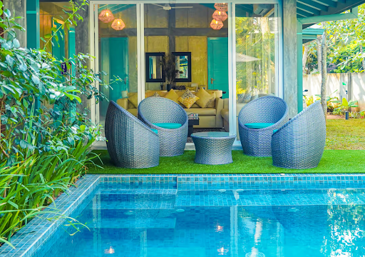 Outdoor pool and garden seating at Villa Blue Monk, an intimate villa near Yala
