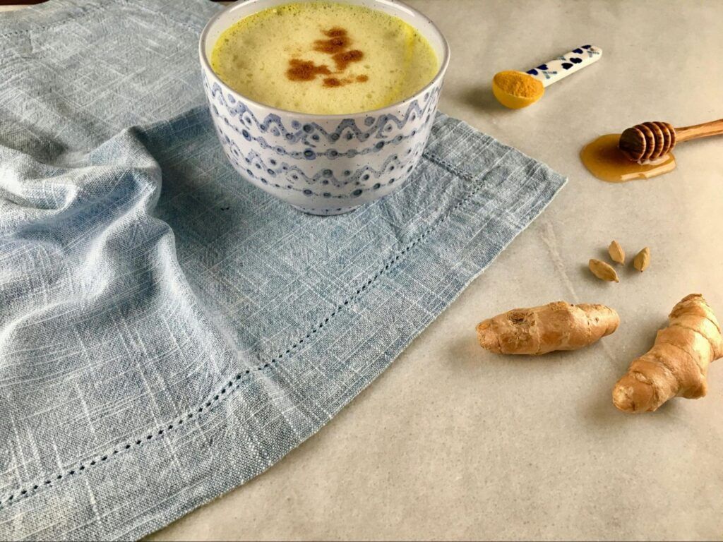 Ayurvedic herbal drink with turmeric, ginger and spices for stress and anxiety support