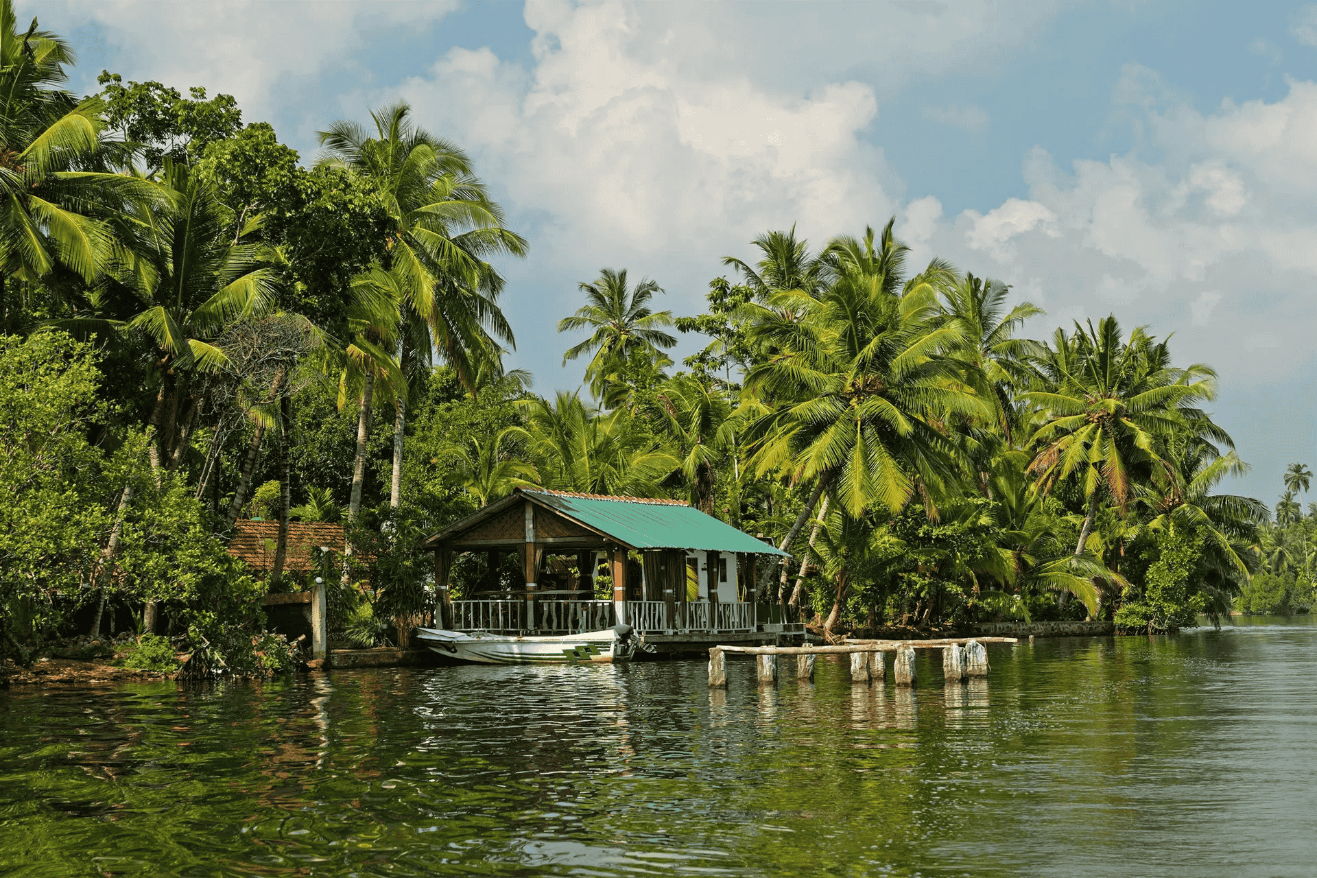 Boat ride on Koggala Lake near Weligama with mangroves and island views