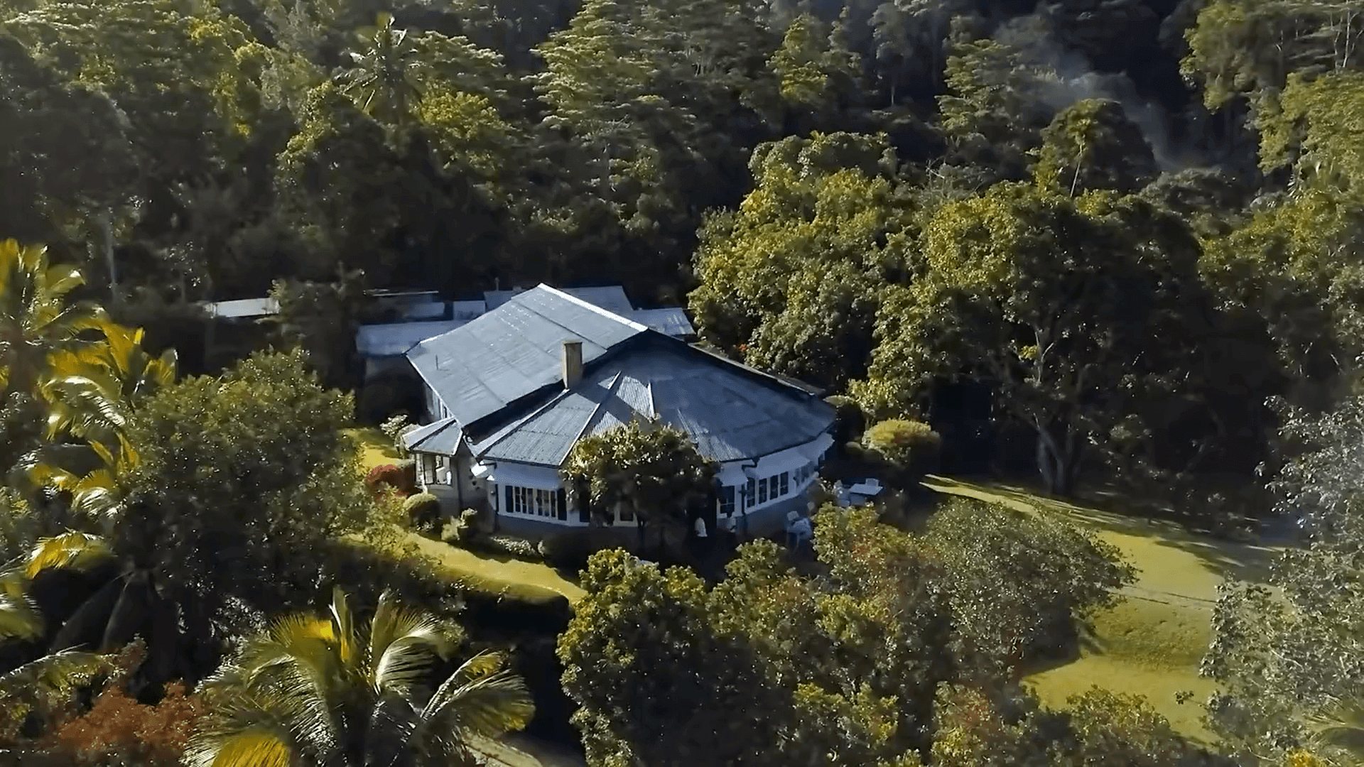 Aerial view of Mountbatten Bungalow surrounded by gardens in Kandy