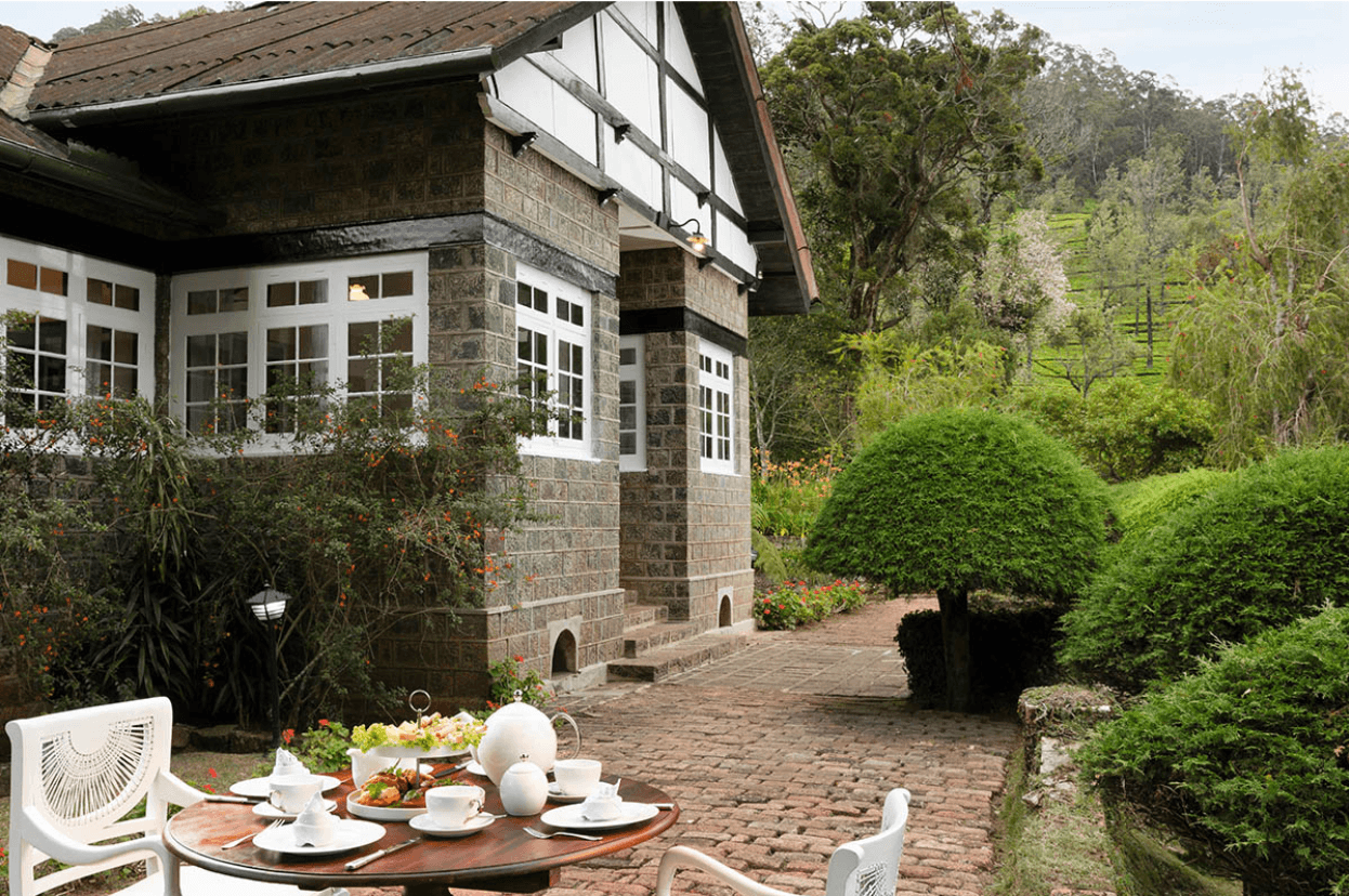 A table set for high tea in the garden at Scottish Planter Bungalow, Nuwara Eliya.