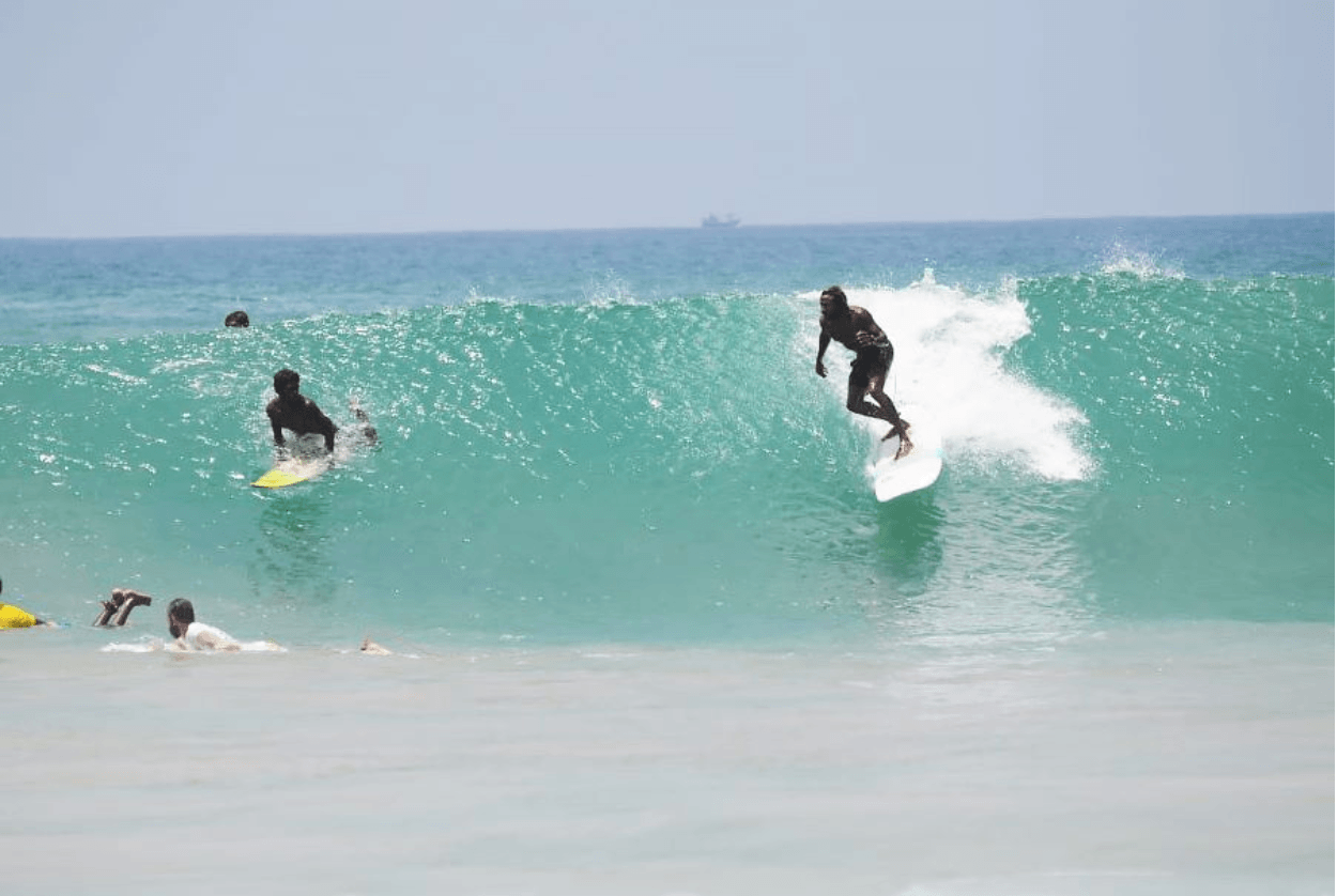 Surfers at Narigama Beach, Hikkaduwa.