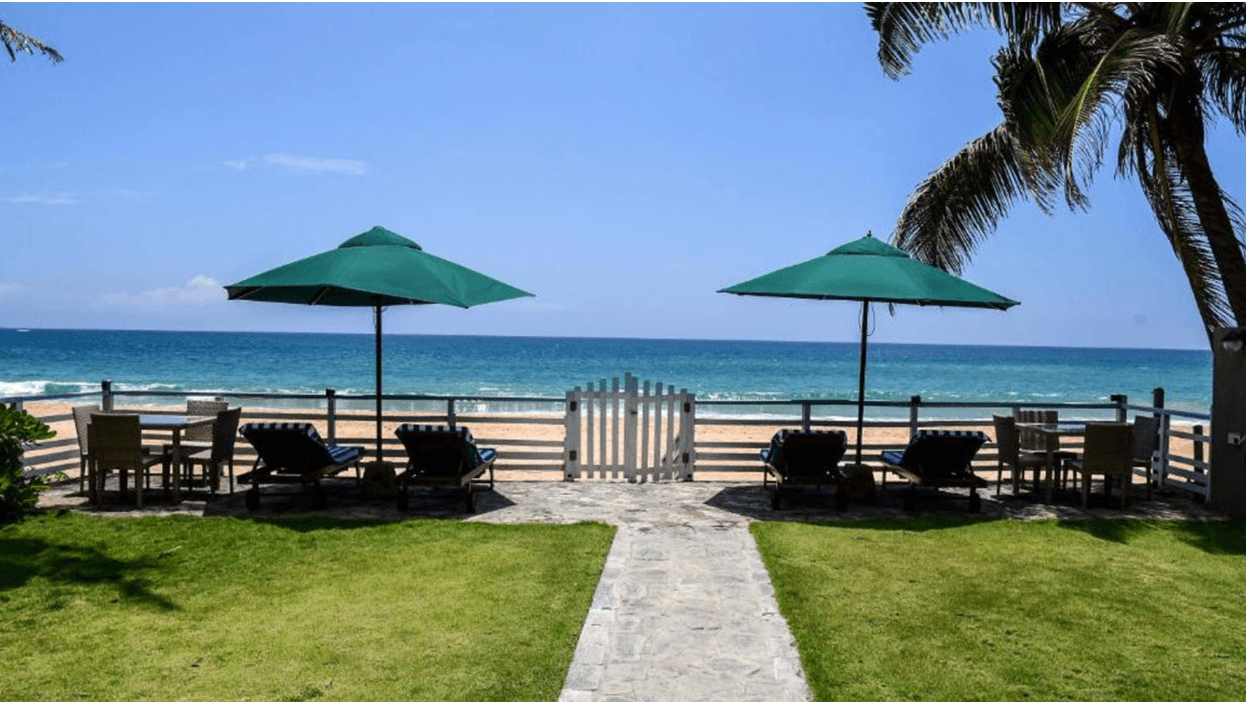 Hikka House's beach access on the quiet Dodanduwa coastline.