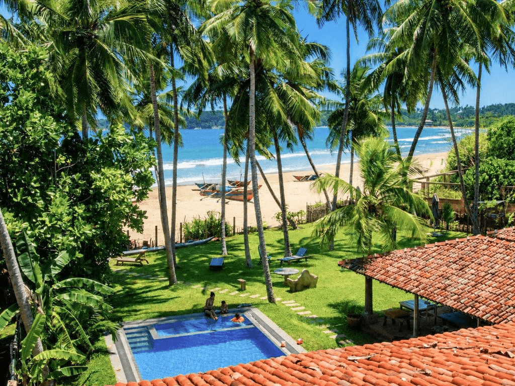 Courtyard pool and tropical garden at Deewara near Mawella Beach